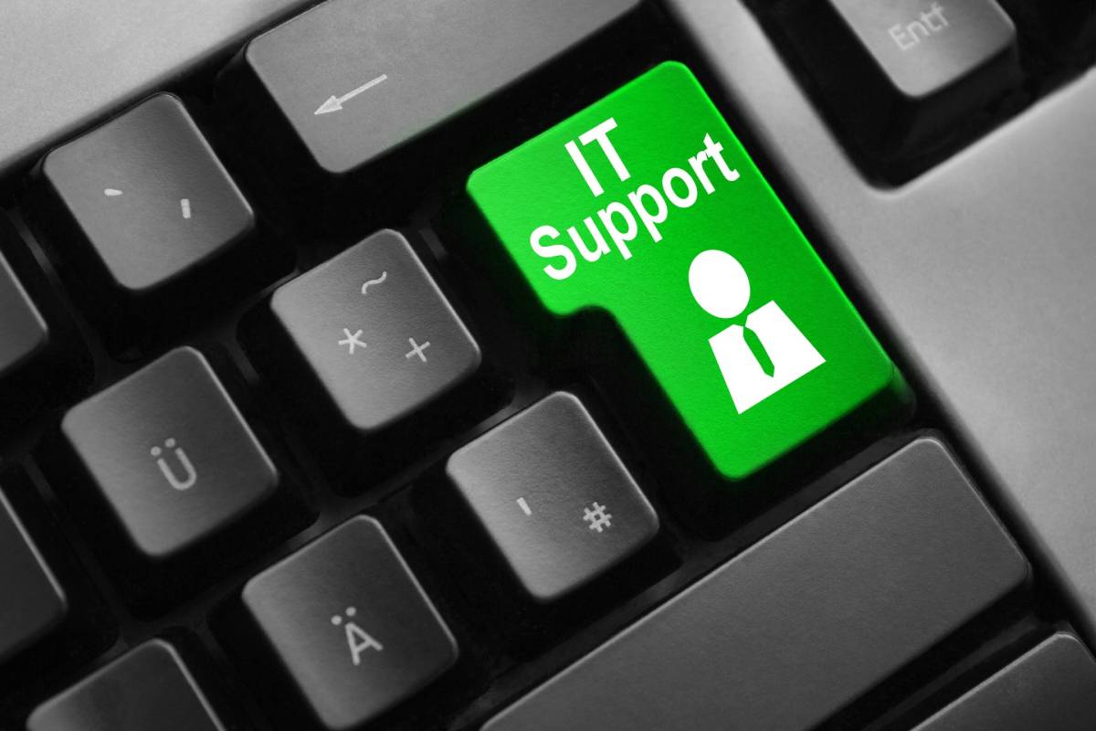 A gray keyboard with a green button saying 'IT Support'