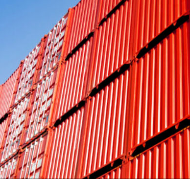 Side view of red metal shipping containers