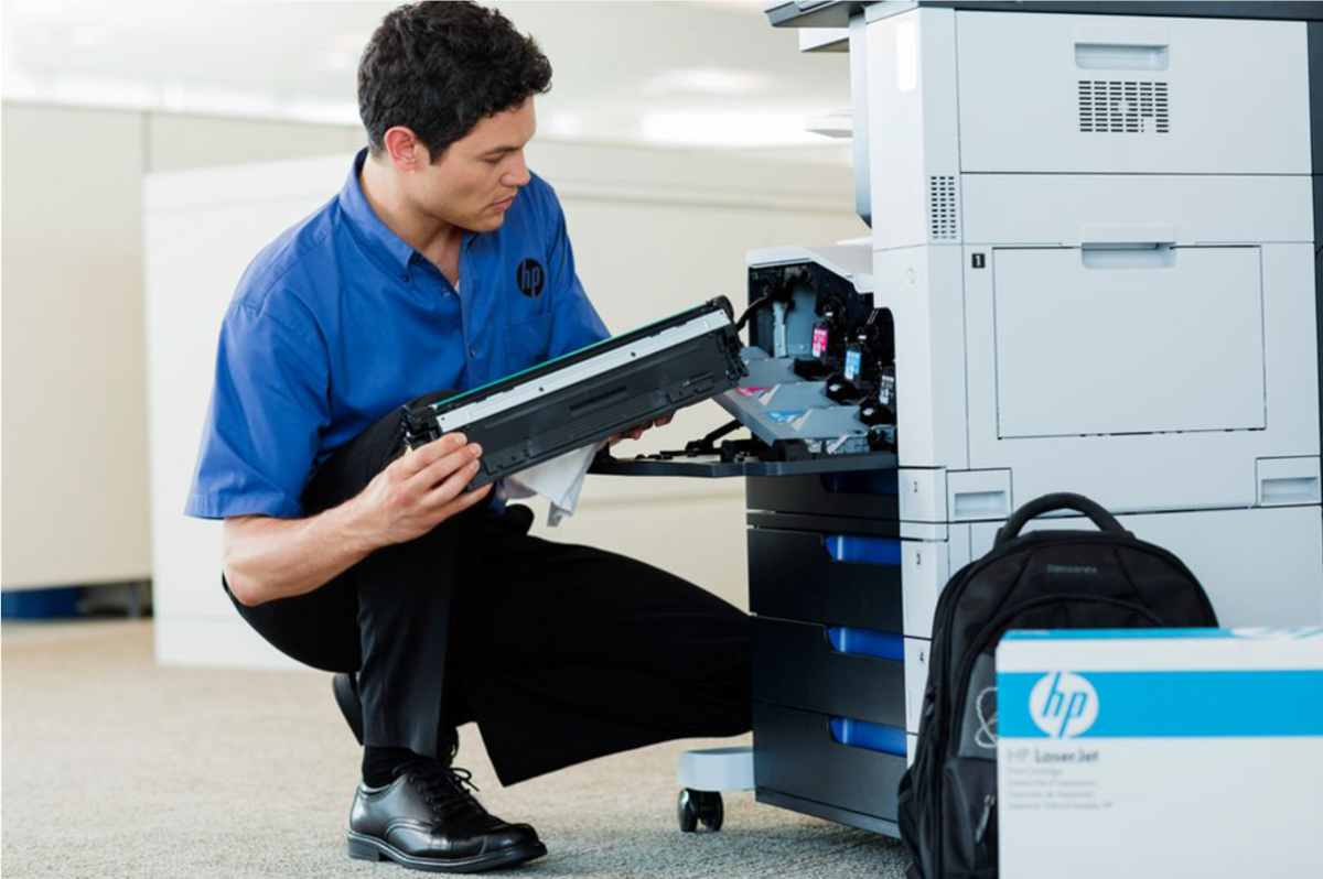 Service Technician Changing Toner in HP Multifunction Printer / Copier